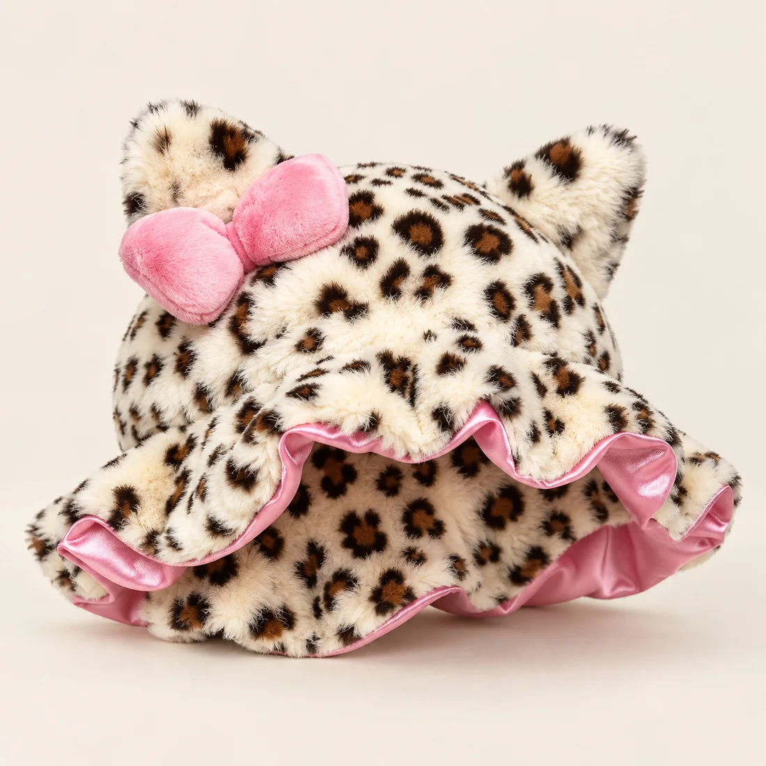 Bonnet de nuit léopard à nœud rose · vue de trois quarts